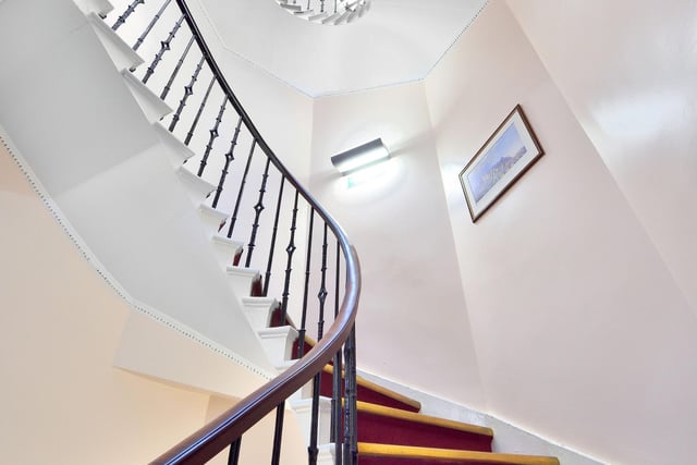 Each floor in the townhouses is connected by a centrally located curved staircase, with a cupola above allowing plenty of daylight. Photo: Ryden