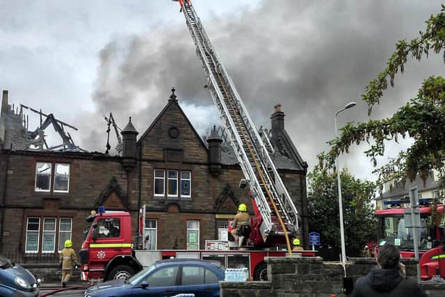Firefighters tackle the blaze at Corstorphine Public Hall in Kirk Loan in October 2013.  Picture: Sandy Irvine