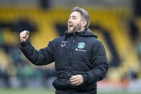 Hibs boss Lee Johnson celebrates at full time after the 4-1 victory over Livingston