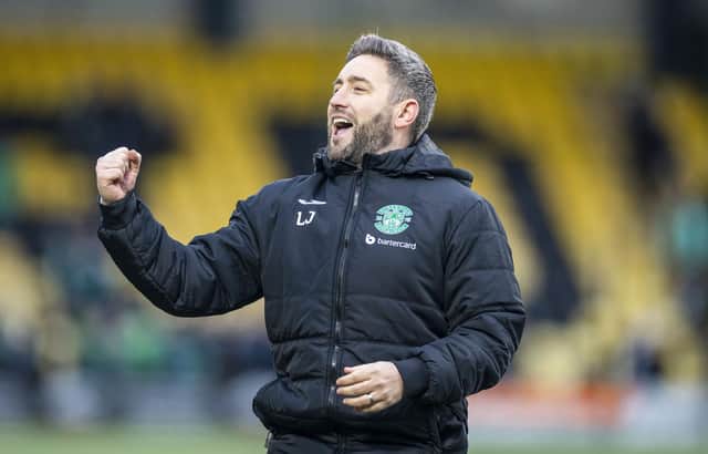 Hibs boss Lee Johnson celebrates at full time after the 4-1 victory over Livingston