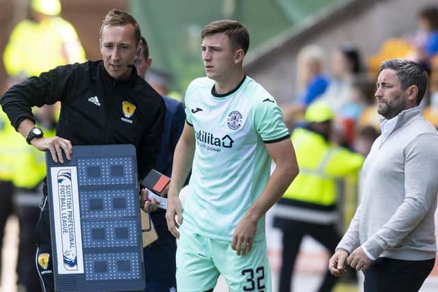 Josh Campbell prepares to come on as a late substitute against St Johnstone