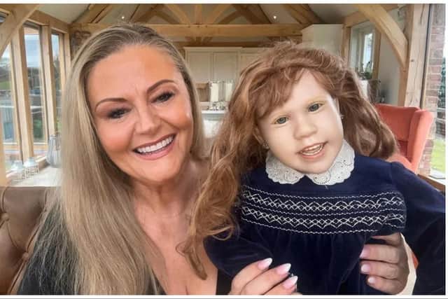 A "creepy" doll which terrified locals when was on display in an Edinburgh charity shop has been bought by celebrity psychic Deborah Davies. Photo: Deborah Davies