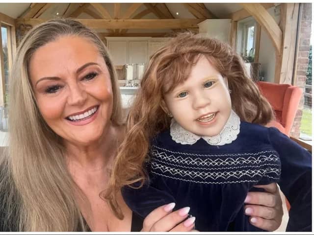A "creepy" doll which terrified locals when was on display in an Edinburgh charity shop has been bought by celebrity psychic Deborah Davies. Photo: Deborah Davies