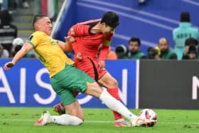 Australia defender Lewis Miller brings down South Korea's Son Heung-min to concede a 96th minute penalty in the Asian Cup quarterfinal.
