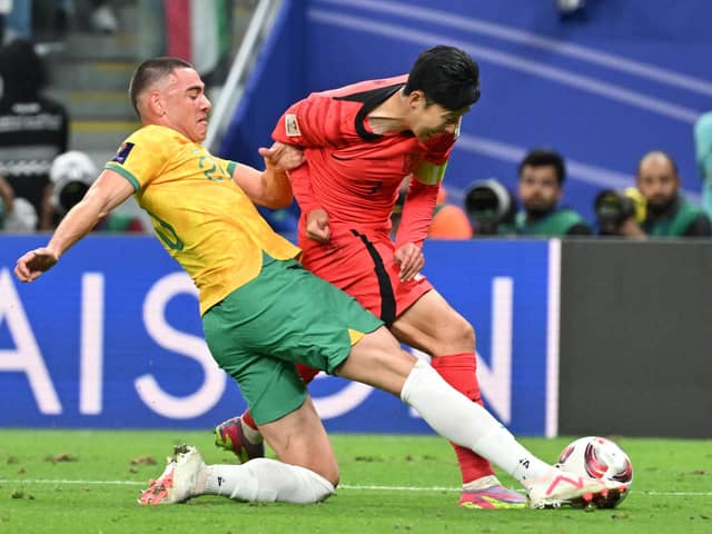 Australia defender Lewis Miller brings down South Korea's Son Heung-min to concede a 96th minute penalty in the Asian Cup quarterfinal.