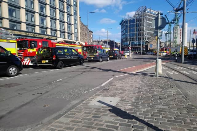 A woman was rushed to hospital after falling onto the tracks at Haymarket train station.