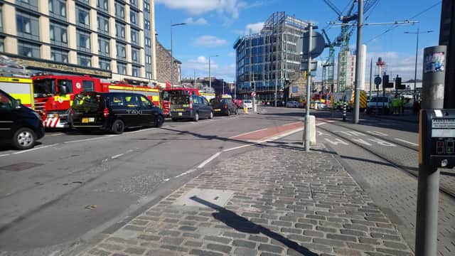 A woman was rushed to hospital after falling onto the tracks at Haymarket train station.