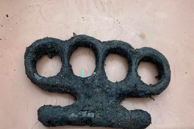 Packs a punch: Knuckleduster hauled from the canal
