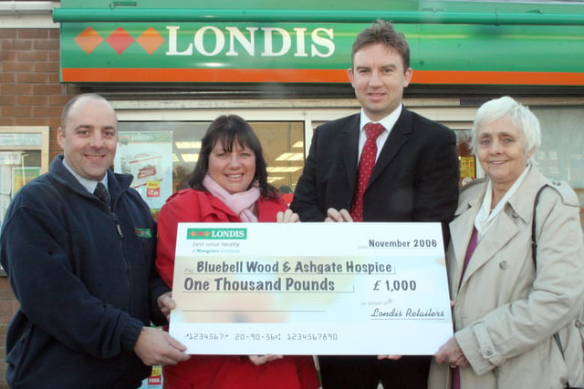 A cheque was made to Ashgate & Bluebell Wood hospice  from Londis golf day in 2006 l to r  Terry Caton, Jo Edwards,Michael Spencer and Joy Bramley.
