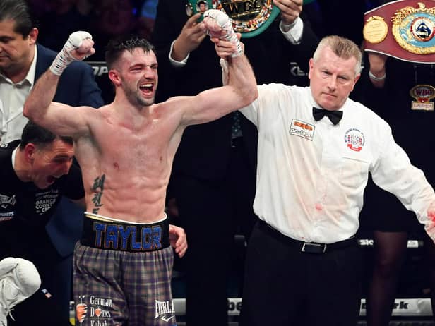 Josh Taylor is declared the victor over Jack Catterall during the WBA, WBC, WBO & IBF world super-lightweight title fight at the OVO Hydro.