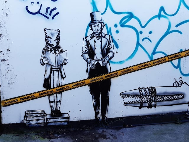 Following a controversial decision to rewrite some of Roald Dahl’s children’s books, street artist, The Rebel Bear, created this artwork on the underpass at Sighthill roundabout on Calder Road earlier in the year. The work includes Willy Wonka in handcuffs with his mouth gagged and Matilda with a bag on her head.