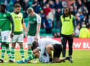 Jamie McAllister consoles Marijan Cabraja after the final whistle in the Hibs-Rangers game