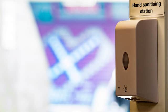 A hand sanitiser station in the stand at Tynecastle Park.