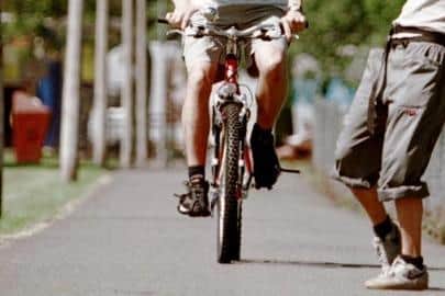 The councillor is calling for action to tackle cyclists speeding on the path and failing to use their bells to warn pedestrians.