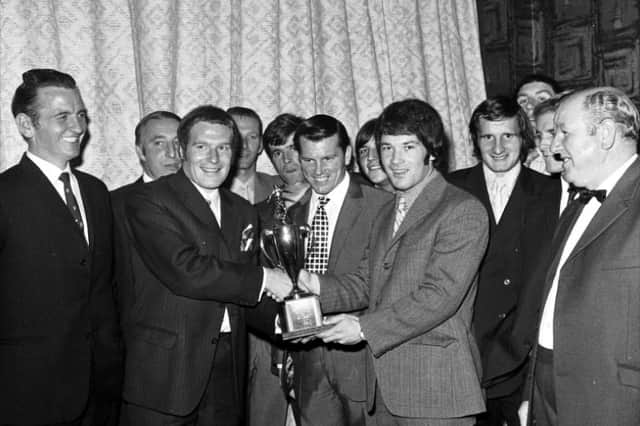 Shevlane, third left, receives the Hibs' Player of the Year trophy from previous winner Jimmy O'Rourke. Picture: Stan Warburton / TSPL