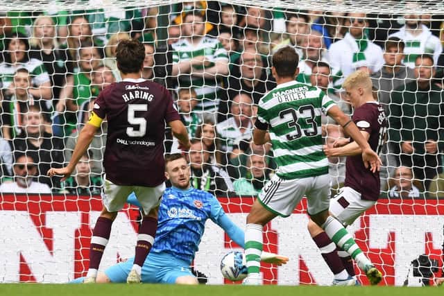Hearts goalkeeper Ross Stewart produces a save to keep his side in the game. Picture: Craig Foy / SNS