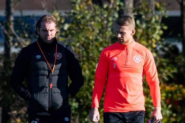 Hearts manager Robbie Neilson and defender Stephen Kingsley.