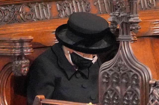 The Queen bows her head during the funeral of the Duke of Edinburgh