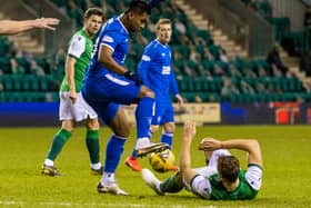 Kris Boyd couldn't understand what Alfredo Morelos was doing stamping on Ryan Porteous. Picture: SNS
