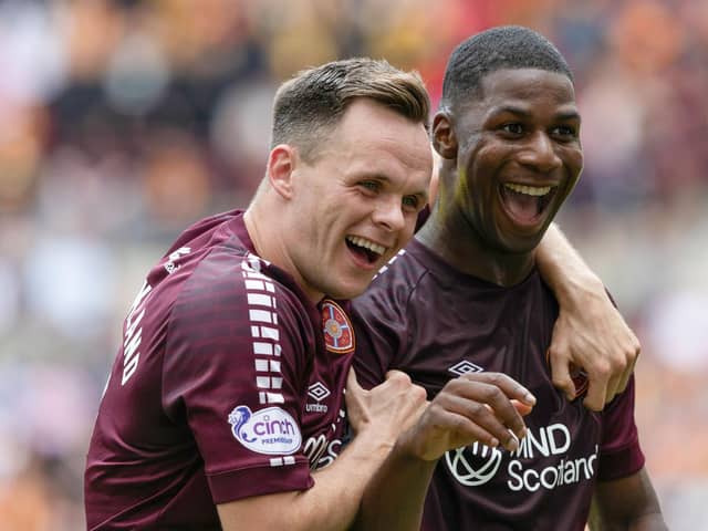 Hearts' new loan signing Odel Offiah celebrates with Lawrence Shankland after scoring on his debut against Partick Thistle. Pic: SNS