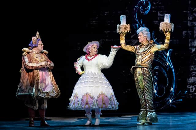 Nigel Richards as Cogsworth, Sam Bailey as Mrs Potts, Gavin Lee as Lumiere in Disney's Beauty and the Beast