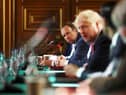 Matt Hancock, who has resigned as Health Secretary, looks towards Boris Johnson during a Cabinet meeting last July (Picture: Simon Dawson - WPA Pool/Getty Images)