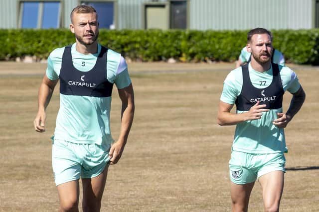 Ryan Porteous, left, and Martin Boyle during a first-team training session at HTC