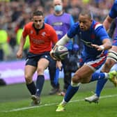 Gael Fickou scores France's third try just before half-time after Scotland had squandered two good opportunities. (Photo by PAUL ELLIS/AFP via Getty Images)