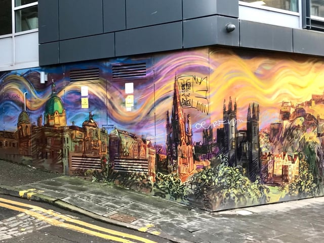 Business consulting company, Capita, approached Chris Rutterford in 2019 after an on-going issue with unsightly graffiti outside their offices on Morrison Street. The Scottish artist created a beautiful panoramic mural of the capital that brightens up the former dark coloured building. Capita have since vacated the premises but passers-by can still enjoy the colourful creation.