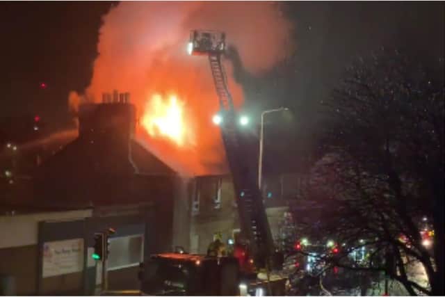 The Scottish Fire and Rescue Service (SFRS) deployed three vehicles and a height appliance to Longstone Road in Edinburgh.
