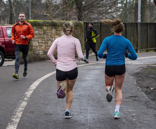 Joggers should wear a mask when running past people, experts have said.