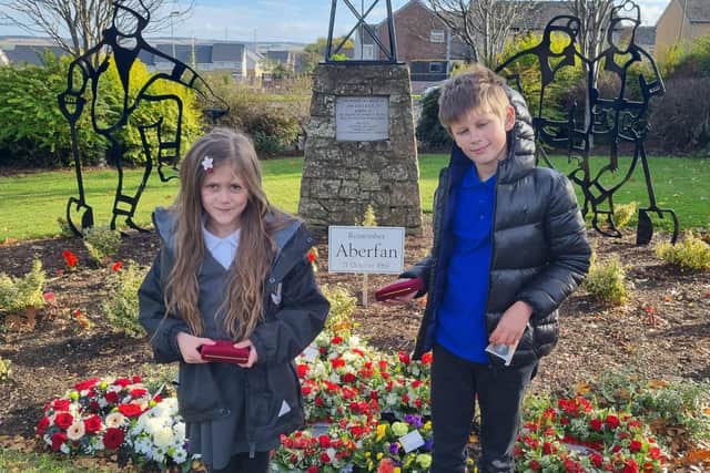 Brother and sister Ethan and Robyn Harris laid a wreath for Danderhall Primary School.