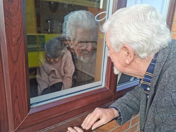 During the Covid lockdown, people have been unable to go inside care homes to visit relatives (Picture: SWNS)