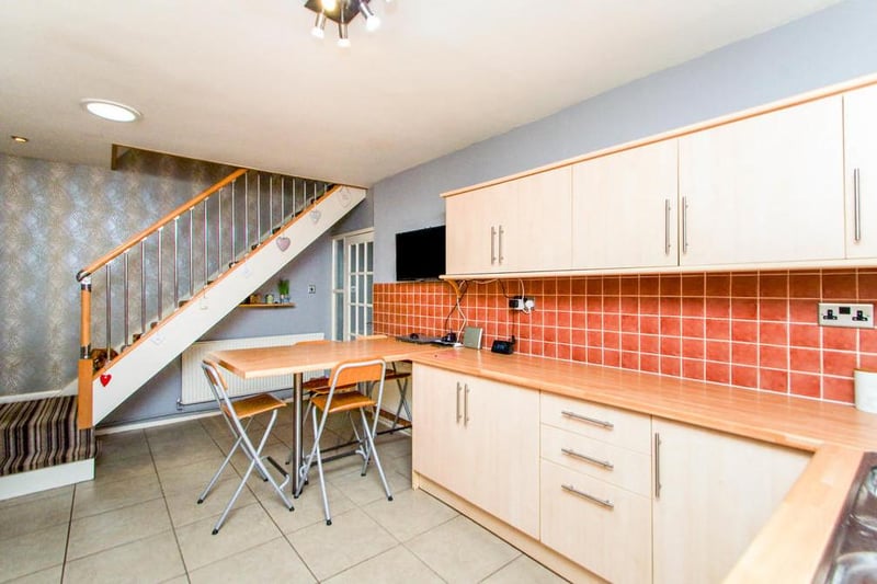 You might be wondering how a bungalow can feature stairs. But these, leading from the kitchen, take you to the property's loft conversion.