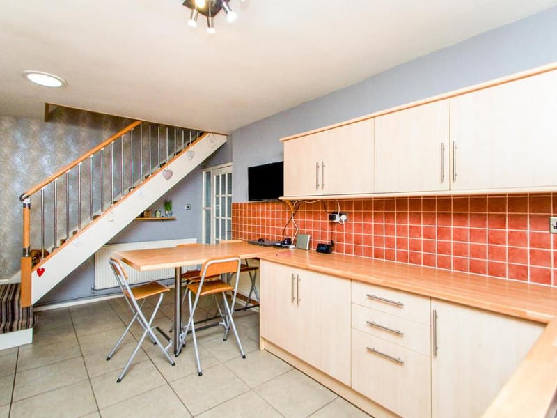 You might be wondering how a bungalow can feature stairs. But these, leading from the kitchen, take you to the property's loft conversion.