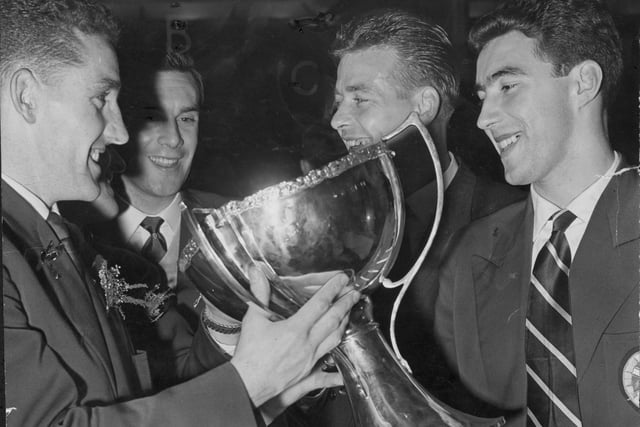 Hearts players celebrate winning the League Cup by beating Partick Thistle 5-1 in 1958. Pictured left to right are Dave MacKay, Jimmy Murray, Willie Bauld and Ian Crawford.