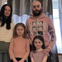 Vicky Souter, Alistair Ross and daughters Imogen, eight, and Akeelah, four, are all suffering health problems as a result of the mould in their flat.