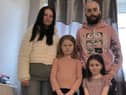 Vicky Souter, Alistair Ross and daughters Imogen, eight, and Akeelah, four, are all suffering health problems as a result of the mould in their flat.