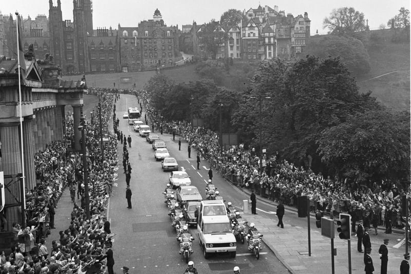 The Popemobile carrying Pope John Paul II makes its way down the Mound from the Assembly Hall in Edinburgh in June 1982. 