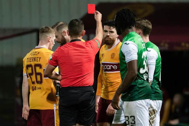 Motherwell's Liam Donnelly is sent off for a second yellow card after a late tackle on Drey Wright