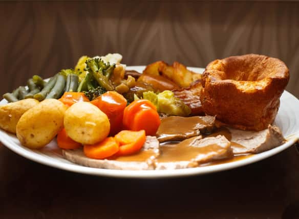 Tuck into a Sunday lunch with all the trimmings at one of these Edinburgh restaurants. Photo: Suzyanne16 / Getty Images / Canva Pro.