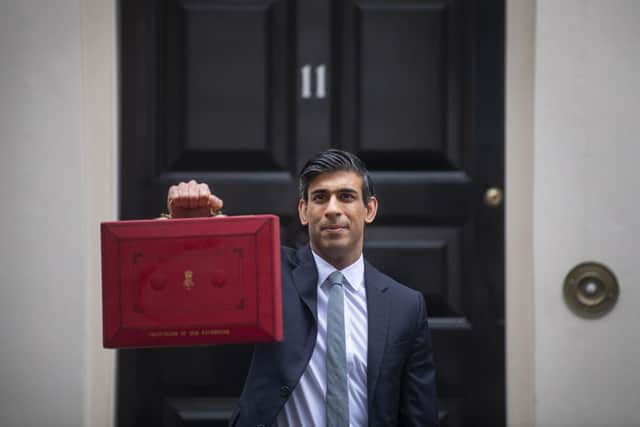 Mr Sunak confirmed the national minimum wage and the national living wage will increase for the 2021/22 financial year, during his Budget delivery. (Pic: PA)