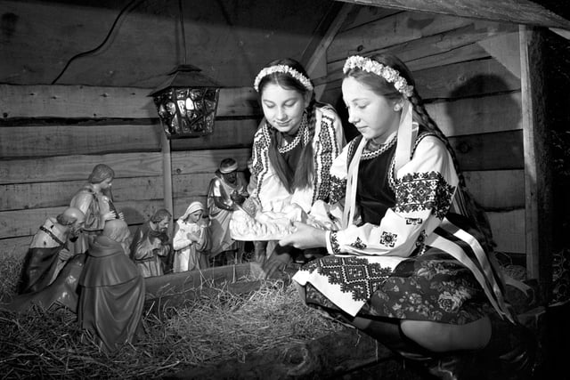 Dressed in their national costume, sisters Lydia and Maria Lestuik are pictured with a nativity scene at the Ukrainian Free Church in Dalmeny Street, in December 1981.