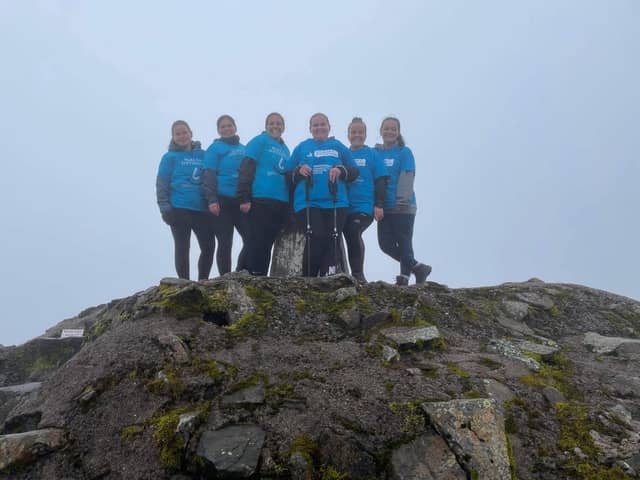 The Neri family at the summit of Ben Nevis.