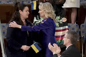Ukrainian Ambassador to the United States Oksana Markarova, left, is hugged by first lady Jill Biden as she is recognized as President Joe Biden delivers his State of the Union address to a joint session of Congress at the Capitoll. Picture, Win McNamee, Pool via AP