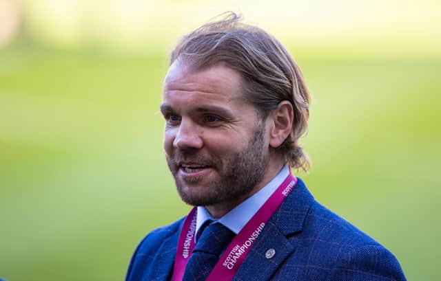 Hearts manager Robbie Neilson with his Championship medal.