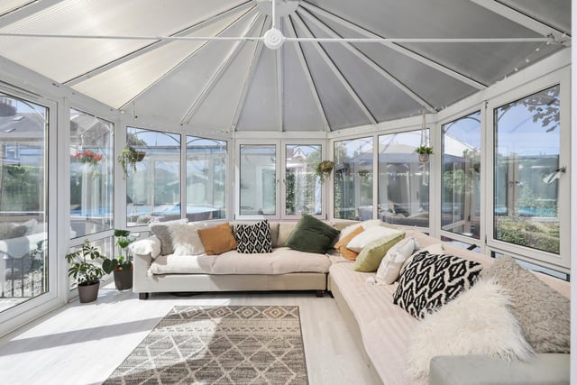 The property's bright and airy conservatory is the perfect spot in the home to relax,