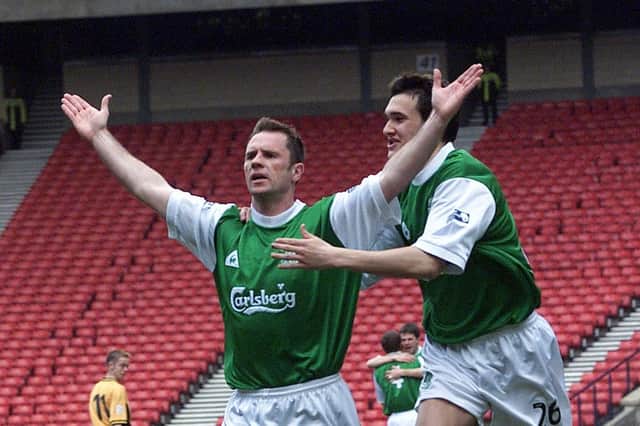 John O'Neil laps up the plaudits after putting Hibs 1-0 up in the Scottish Cup semi-final against Livingston on April 14, 2001. Pic: SNS Group