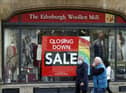 Edinburgh Woollen Mill has accepted a rescue offer which could save hundreds of high street jobs.