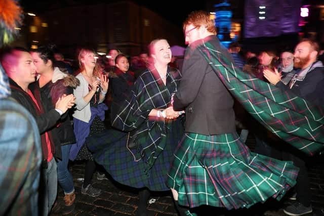 Open-air ceilidh dances have previously been held as part of Edinburgh's Hogmanay celebrations. Picture: Andrew Milligan
